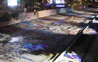 Imagen de Reconocen colaboración del CMN en instalación Artedeluz en Río Mapocho